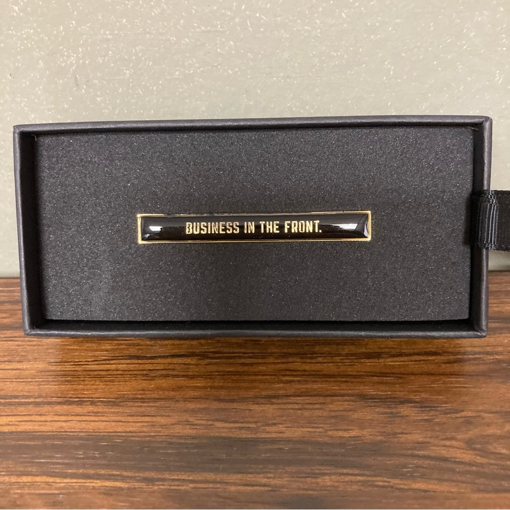 $1 New, Imperfect Easy, Tiger Black Enameled “Business in the Front” Tie Bar
